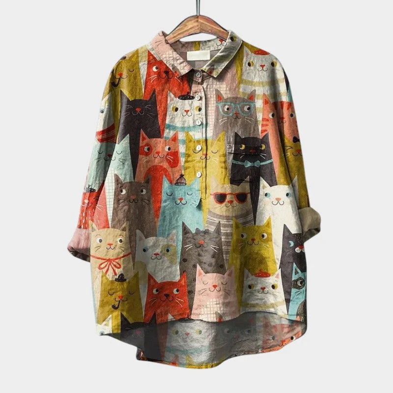 Sommerliche Eleganz – Luftige Bluse mit tropischem Print