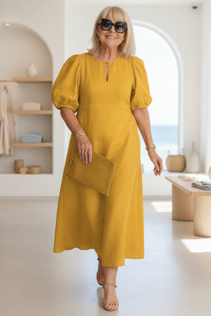 Elegantes Maxikleid mit Puffärmeln: Stilvoll für besondere Anlässe 4