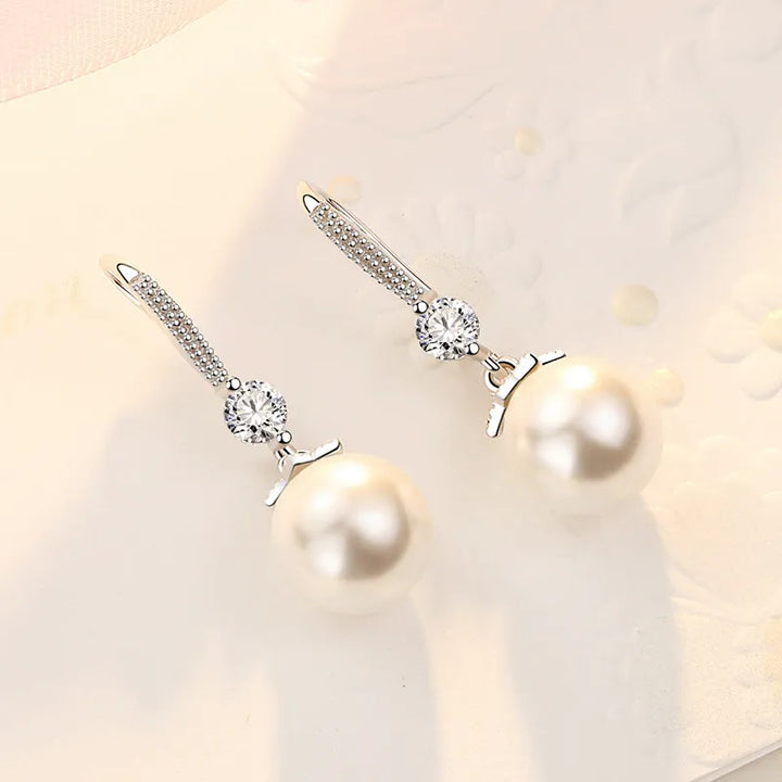 Damen-Ohrhänger mit Zirkonia und Perlen – Elegante, runde Statement-Ohrringe aus Silber