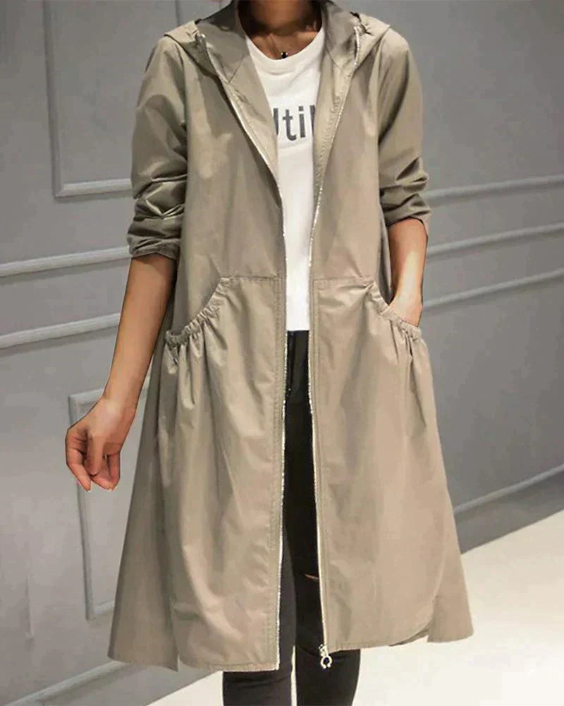 Lange Damen-Regenjacke mit Kapuze – Stilvoll und Wasserdicht für Jeden Anlass 0