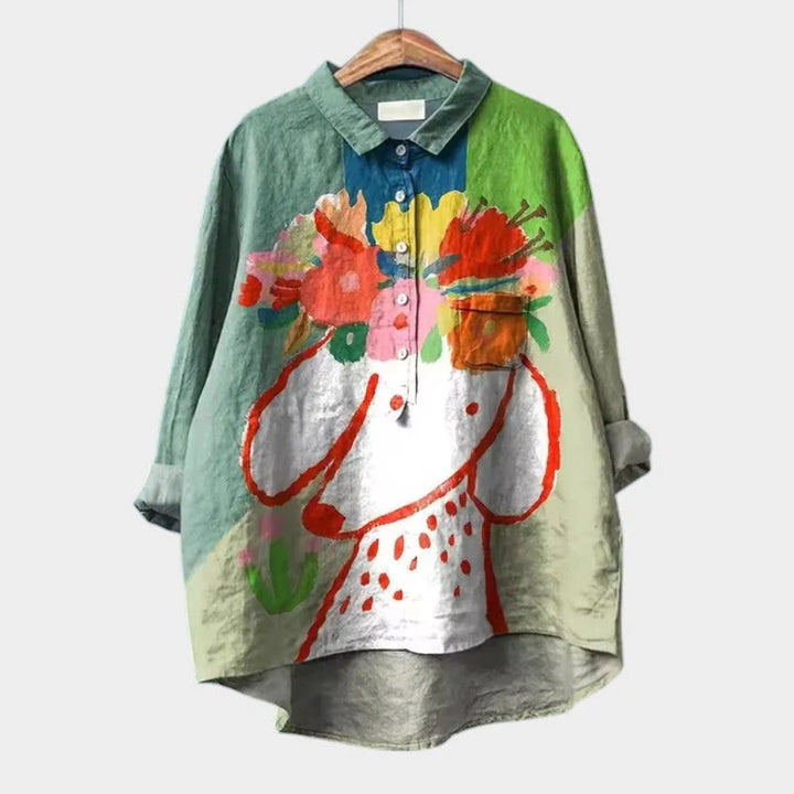 Sommerliche Eleganz – Luftige Bluse mit tropischem Print