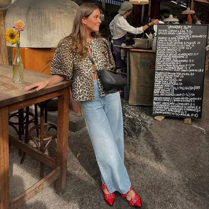 Damenbluse mit Leopardenmuster, Cut-outs und Puffärmeln